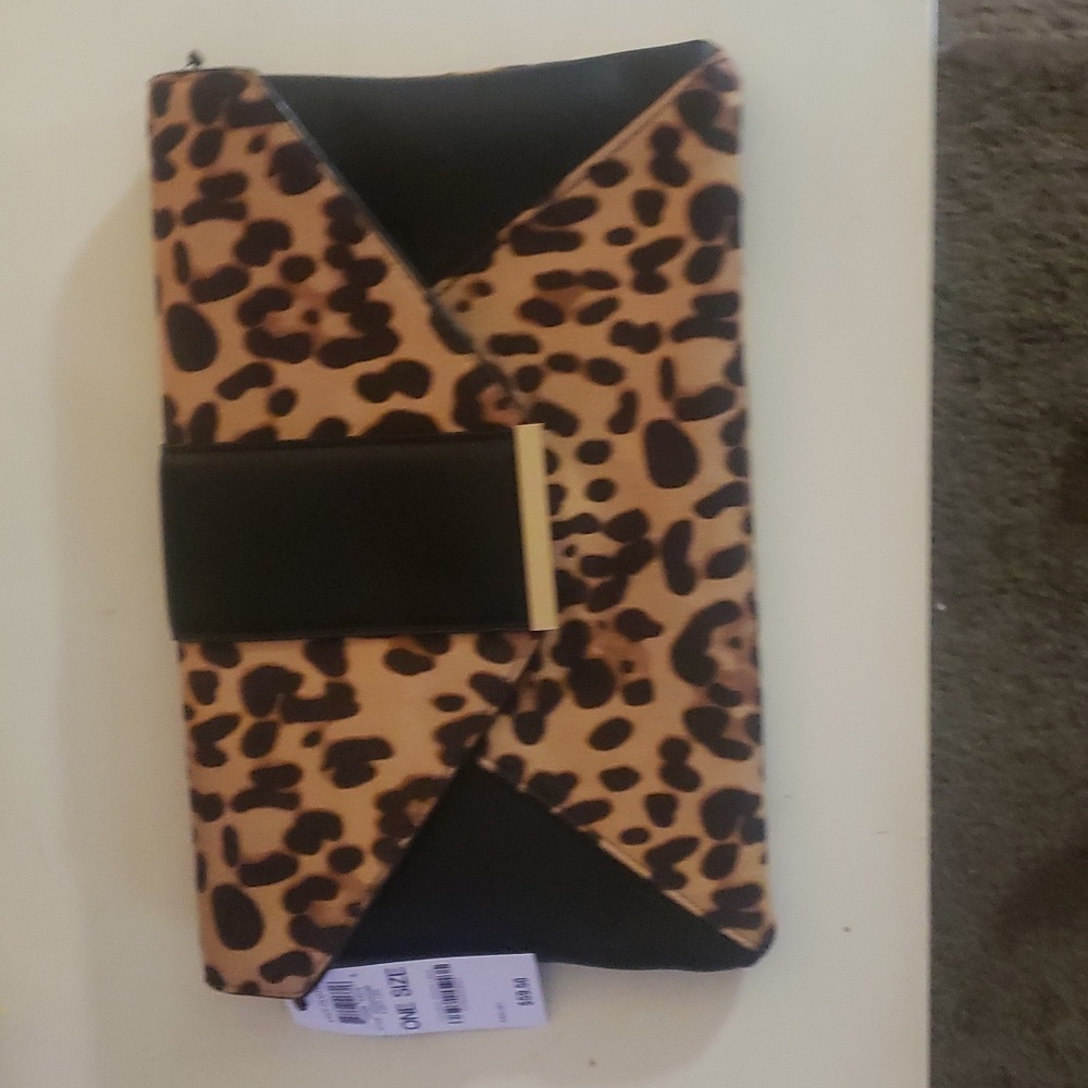 Luci clutch NWT animal print
